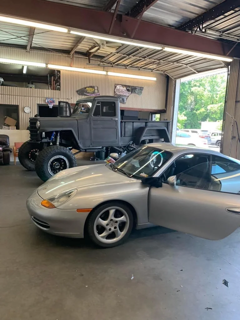 Inside Smith's Window Tinting, LLC — shop interior and work bay